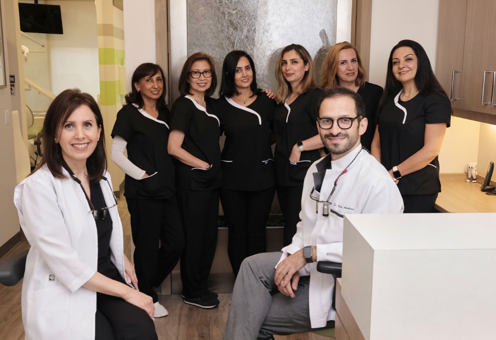 Dr. Mehdi Adibrad, Dr. Neda Kadivar, and the MiNa Family Dentistry team